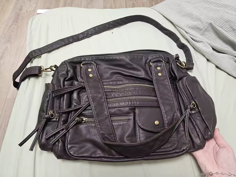 Détails des fermetures d'un magnifique sac de cours pour la fac