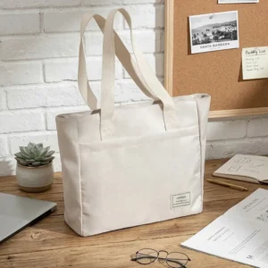 Sac à Main de Cours Semi-Rigide avec Compartiment Antichoc (14) pose sur table